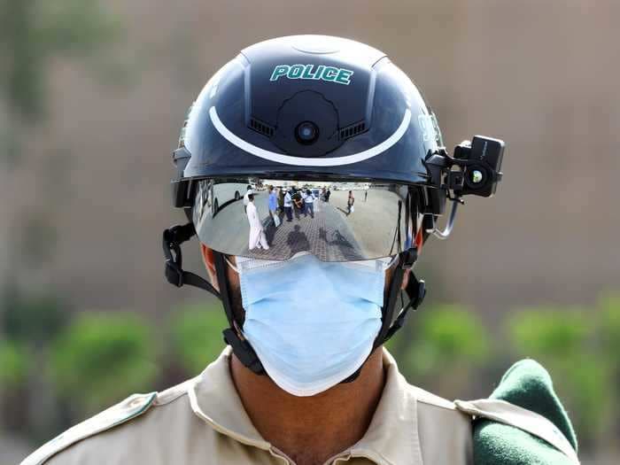 Police in China, Dubai, and Italy are using these surveillance helmets to scan people for COVID-19 fever as they walk past and it may be our future normal