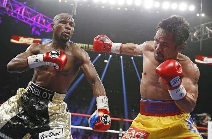 Floyd Mayweather says Manny Pacquiao will beat one of his boxing records, and the Filipino fighter says Floyd is jealous