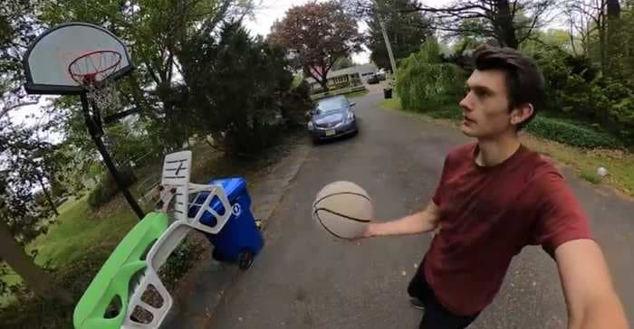 A YouTuber pulled off an astonishing 70-step basketball trick shot, including skateboards, trampolines, and a ping-pong ball roller coaster