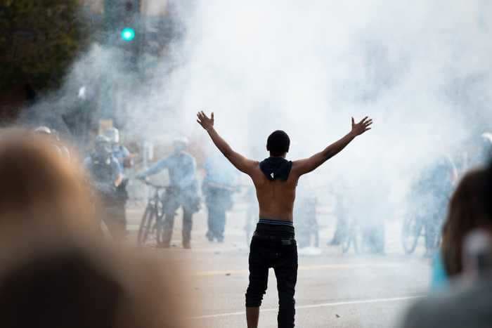 Minneapolis mayor receives assistance from the National Guard as protests over George Floyd's death turn deadly and buildings go up in flames