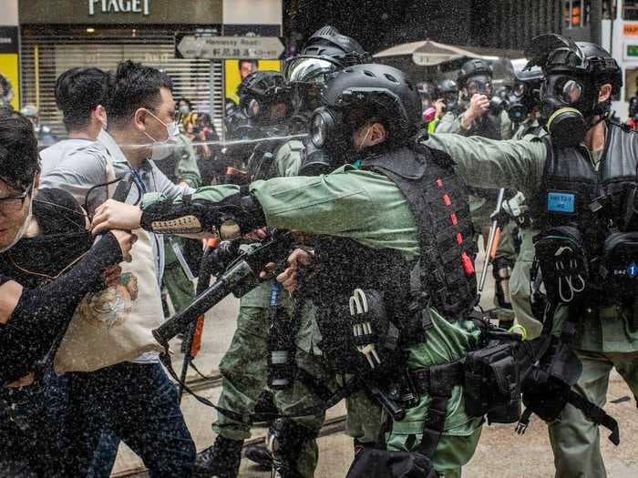 Photos show democracy protests reigniting in Hong Kong after China passed a sweeping measure to crush the city's autonomy