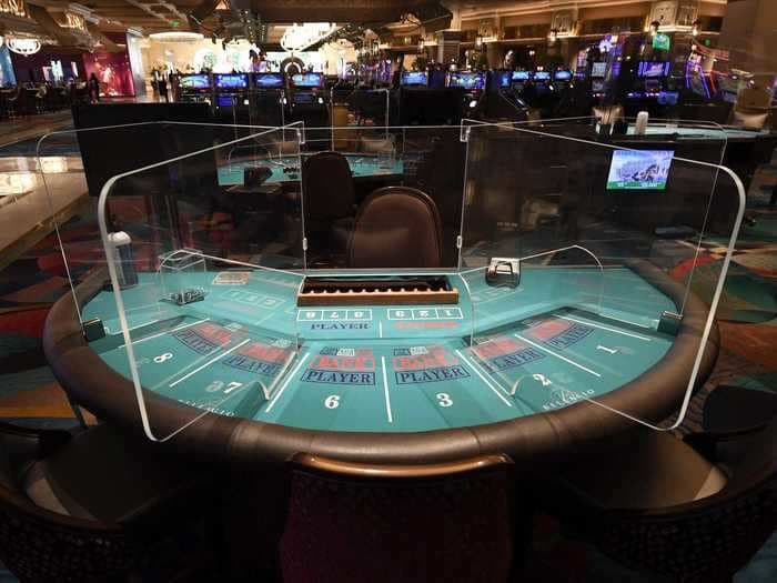 Las Vegas casinos are about to reopen, and photos show that plexiglass shields, hand-washing stations, and out-of-service slot machines will be the new normal