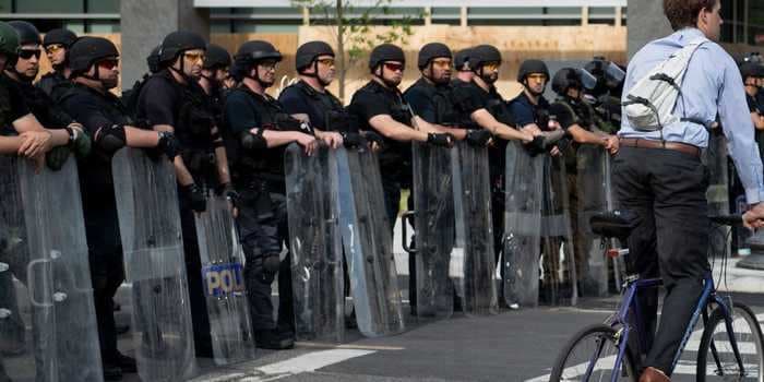 Heavily armed men who refuse to identify themselves are patrolling the streets of Washington, DC. They were sent by the Bureau of Prisons.