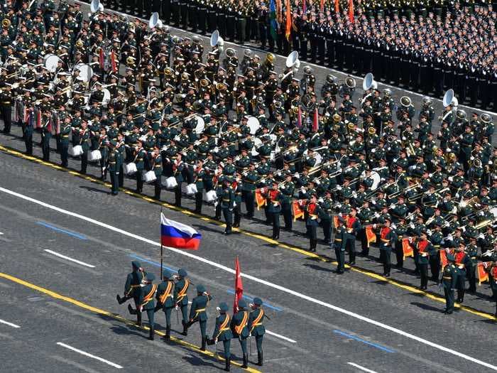 Russia held a massive World War II memorial parade in Moscow despite its coronavirus outbreak. Veterans spent 14 days in quarantine to sit with Putin.