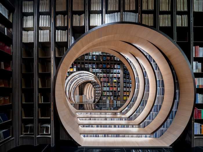A bookstore in Beijing features book tunnels that lead to cozy reading nooks and a café