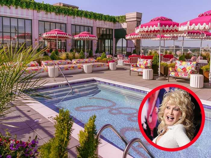 A new rooftop bar inspired by Dolly Parton has hot pink umbrellas, plush couches, and a chicken-wire sculpture of the country music legend — take a look inside