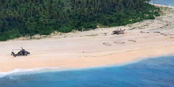 3 men were rescued from an uninhabited Pacific island after they got stranded and wrote 'SOS' in the sand