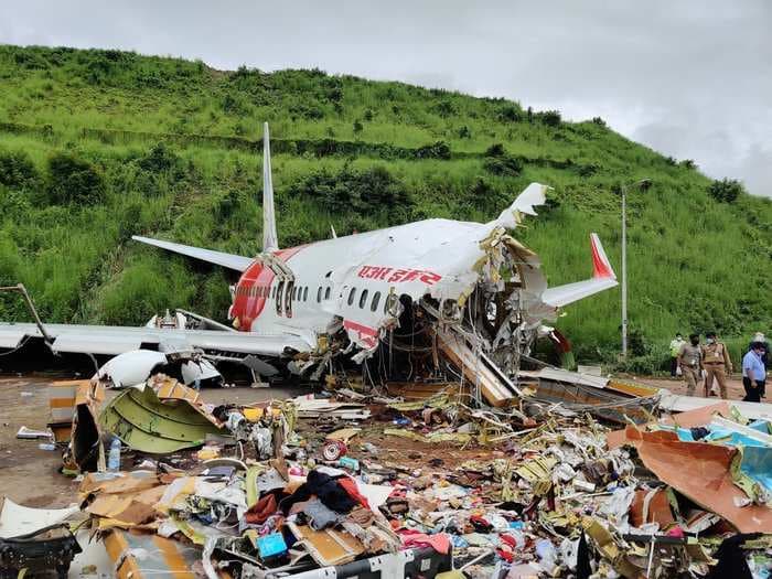 Devastating images show how Air India express plane crash in Kerala split the flight in two and left 18 dead and over a 100 injured