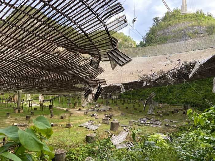 A broken cable smashed a hole 100 feet wide in the Arecibo Observatory, which searches for aliens and tracks dangerous asteroids