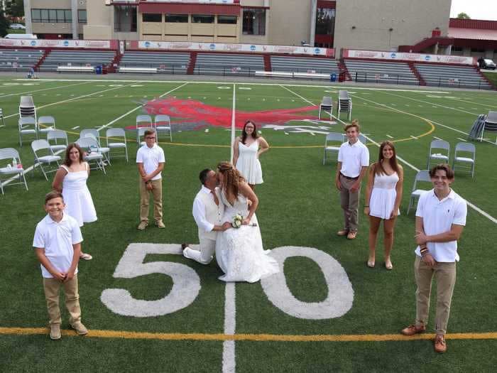A couple got married on their college football field 28 years after being crowned homecoming king and queen