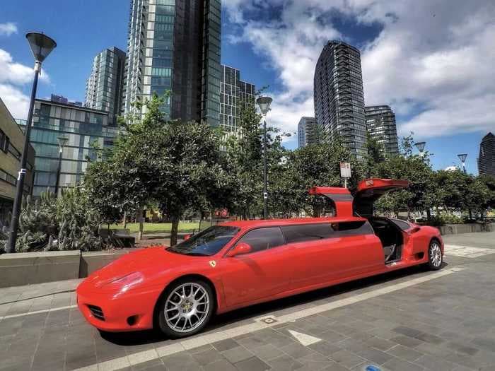 This Ferrari limo with two TVs, a minibar, and seating for 10 can be yours for $287,000 — see inside
