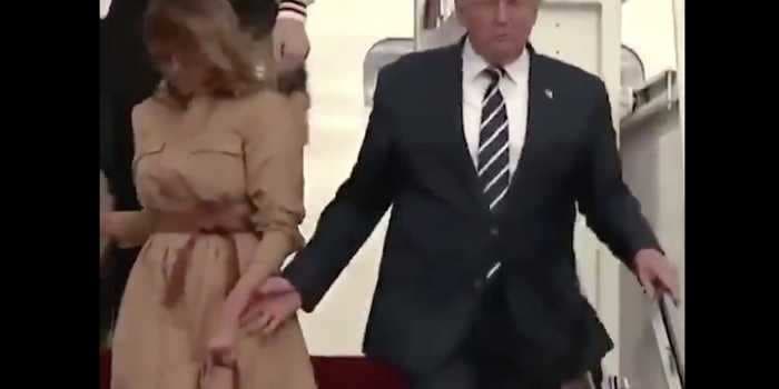 Melania Trump seemed to refuse to hold Donald Trump's hand as they stepped off Air Force One