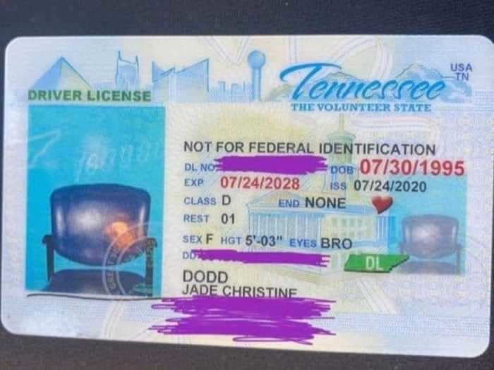 A woman was baffled when her new driver's license featured a photo of an empty DMV chair