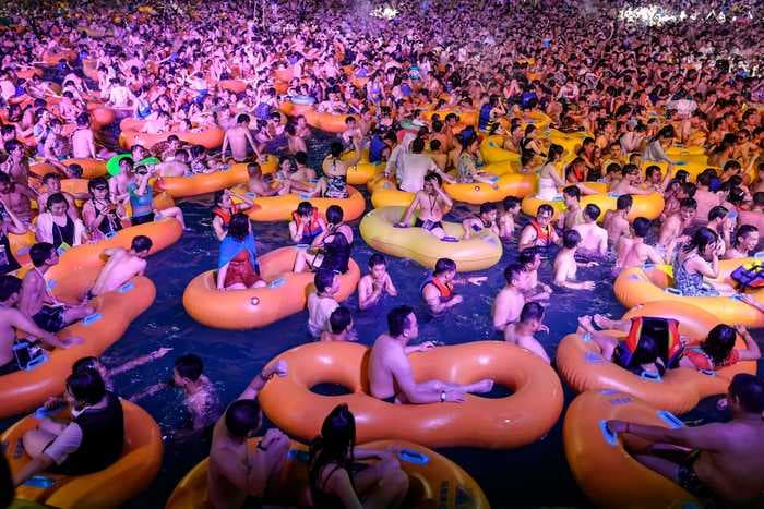 A water-park music festival in Wuhan attracted thousands of partygoers — but residents say normal life is still on pause