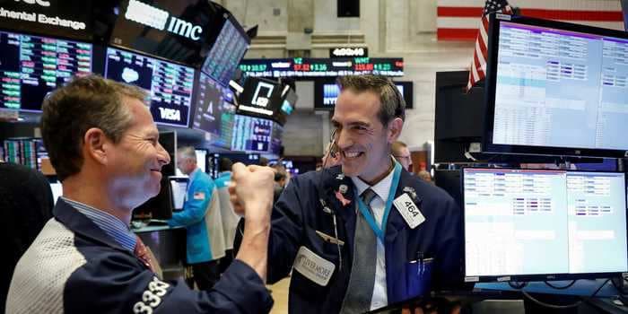 US stocks close at record highs on renewed hopes for fast-tracked virus treatments