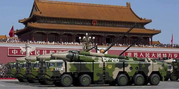 China fires a barrage of reported 'carrier-killer' missiles into the South China Sea as US-China tensions flare