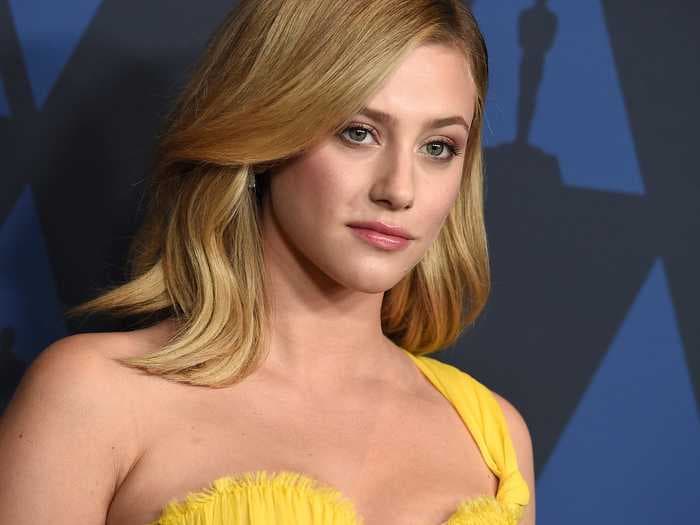 Lili Reinhart says she was hesitant to come out as bisexual because she felt that it was 'becoming a trend' in Hollywood