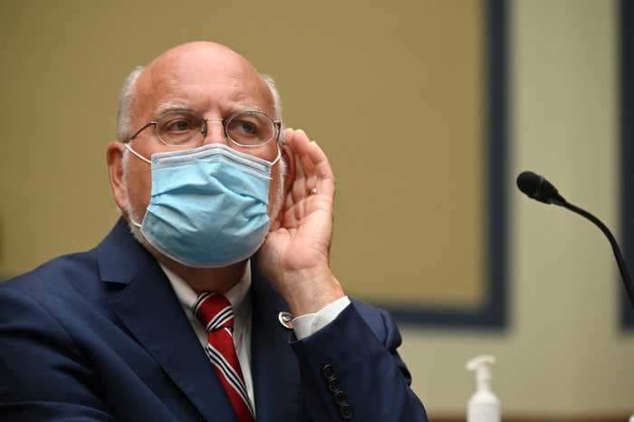 CDC director Robert Redfield said face masks may be more effective than a vaccine in preventing individual coronavirus infections