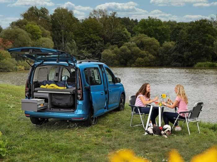 Volkswagen has unveiled its Caddy California camper van with a bed and kitchen — see inside