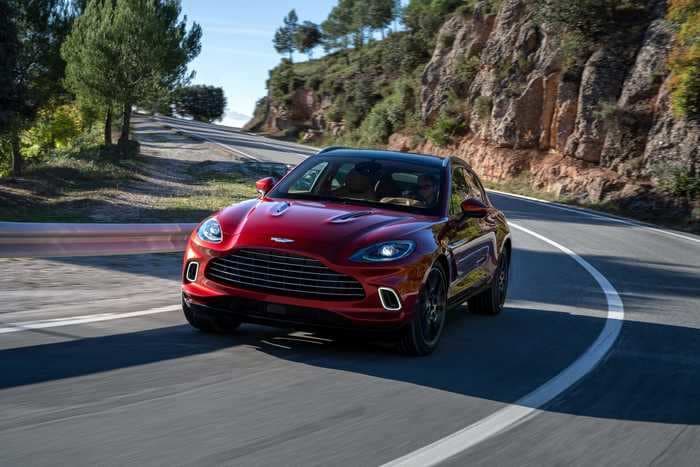 Luxury carmaker Aston Martin will slash its vehicle prices by up to $14,000 to be more competitive