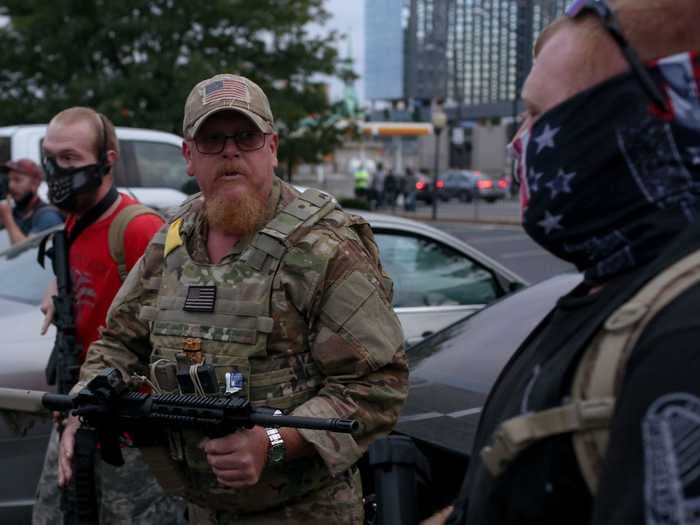 Louisville protesters faced off with an extremist militia on the 2nd day of unrest following no charges for the police involved in Breonna Taylor's killing