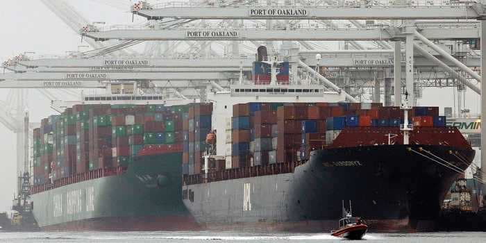 US goods-trade deficit widens to record $82.9 billion in August as imports surge