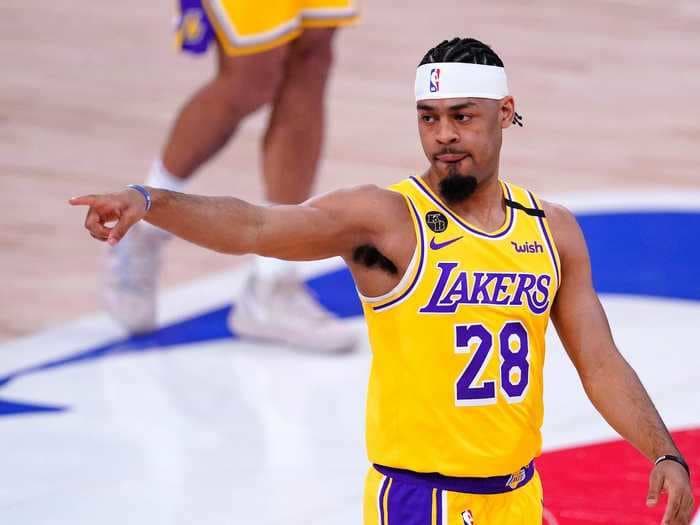 The Lakers' Quinn Cook honored his late father and longtime idol Kobe Bryant after winning an NBA championship with the team he grew up rooting for