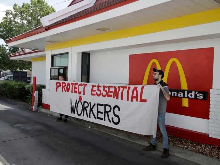 A McDonald's worker accuses the chain of firing her after she protested against a lack of masks and other safety concerns in a new whistleblower lawsuit