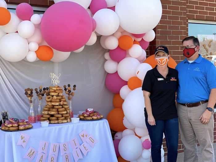 A couple got married at the Dunkin' drive-thru window where they first met 3 years earlier