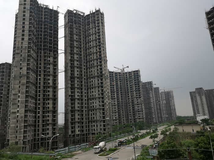 India offers income tax relief for home buyers and developers to boost new property sales