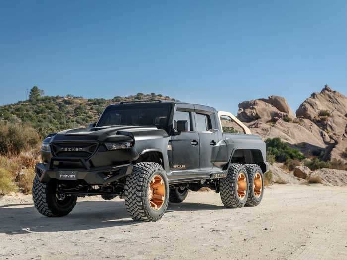 This bulletproof, 6-wheeled, 1,300-horsepower pickup costs up to $700,000 and already has 18 orders — take a closer look at the Rezvani Hercules 6x6