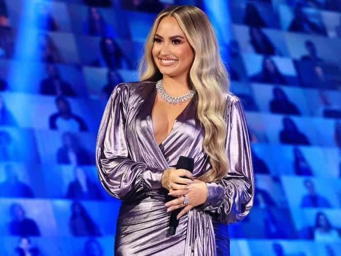 Demi Lovato wore 5 outfits during the People's Choice Awards, from a dazzling minidress to bedazzled baggy pants
