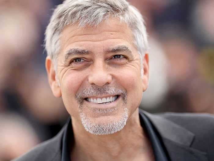 George Clooney finally tells the story of how he once gave each of his 14 best friends a suitcase filled with $1 million