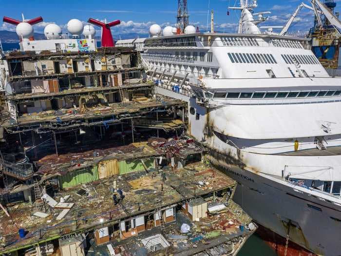 Photos of abandoned, stripped cruise ships show how deeply the cruise industry is sinking