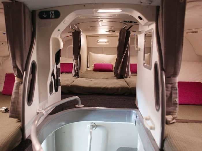 A video shows inside the secret airplane bedrooms where flight attendants sleep on long-haul flights