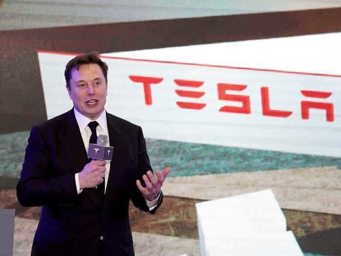 Tesla CEO Elon Musk says he'd be open to merger talks with a rival. 'We'd certainly have that conversation.'