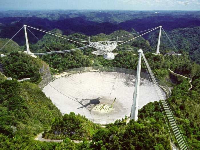 The Arecibo telescope tracked dangerous asteroids, broadcast to potential aliens, and starred in a Bond film. Here's what the world lost when it collapsed.