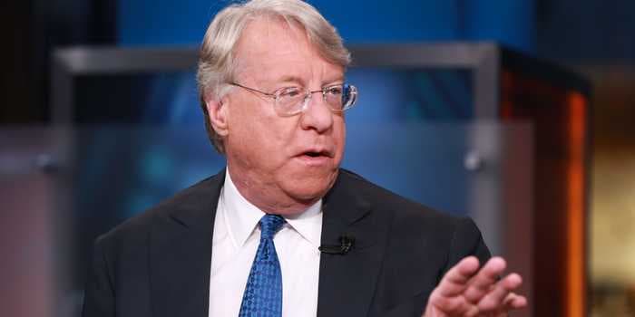 Long-time Tesla bear Jim Chanos reduces his short in the company and says his position has been 'painful'