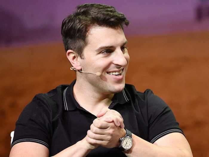 Watch Airbnb CEO Brian Chesky's speechless reaction to finding out Airbnb's expected opening stock price more than doubled ahead of trading