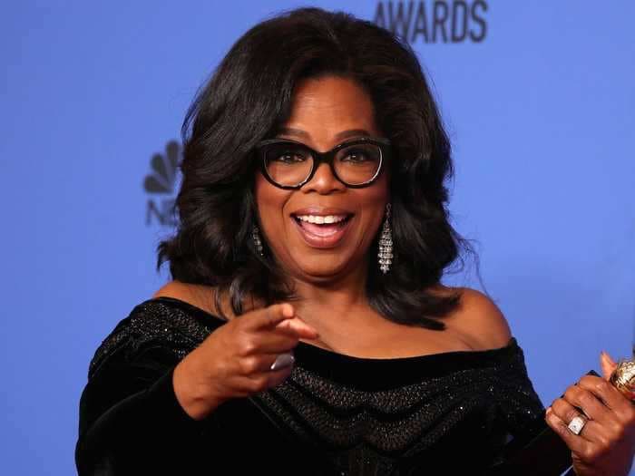 Oprah Winfrey is randomly surprising fans on Twitter with vacations, new computers, and other holiday gifts