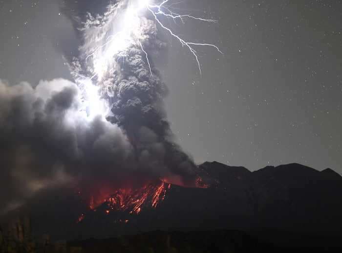 A photographer captured the exact moment lightning struck Japan's Sakurajima volcano as it erupted