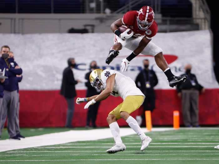 Alabama's Najee Harris honored a promise to Megan Rapinoe with a massive hurdle over a defender during the Rose Bowl
