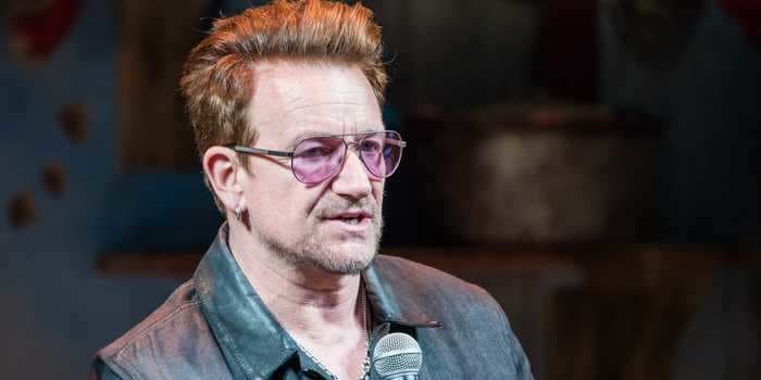 Rock star Bono helped recruit ex-Treasury Secretary Hank Paulson to run a new climate fund