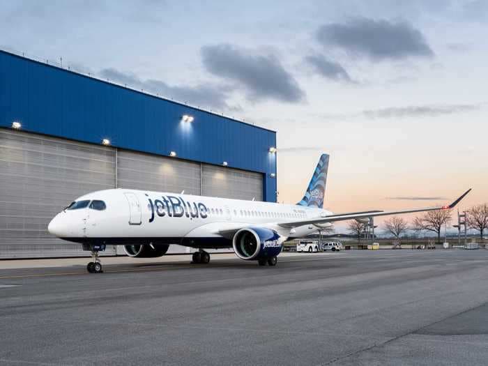 JetBlue just unveiled the ultra-modern cabin of its latest plane - take a look inside its brand-new Airbus A220 jets