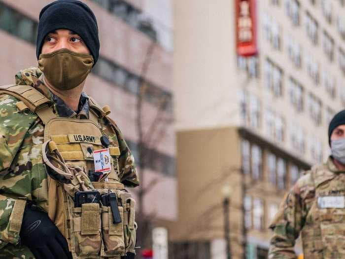 Photos show ramped-up troops and barriers locking down Washington, DC, ahead of Biden's inauguration