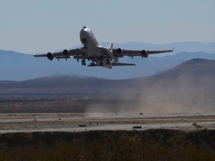 Watch a Virgin Orbit rocket successfully launch from beneath the wing of a Boeing 747, marking the latest entrant to the commercial space race