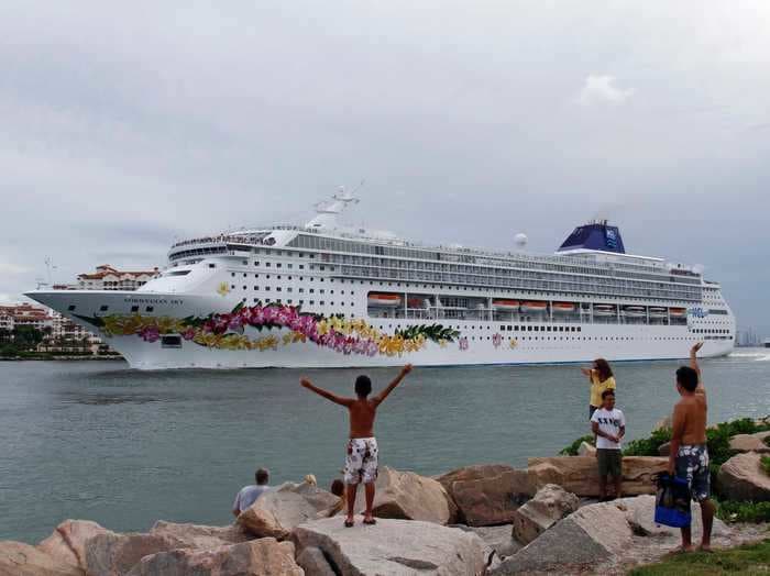 Norwegian Cruise Line will require crew members to get the COVID-19 vaccine before boarding as sailings continue to be pushed back