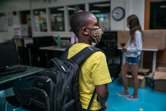 CDC officials recommend opening schools with masks - but closing indoor dining and gyms