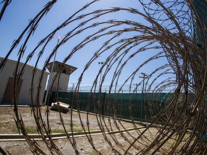Defense Department pauses plan to offer COVID-19 vaccine to Guantanamo Bay prisoners after GOP criticism