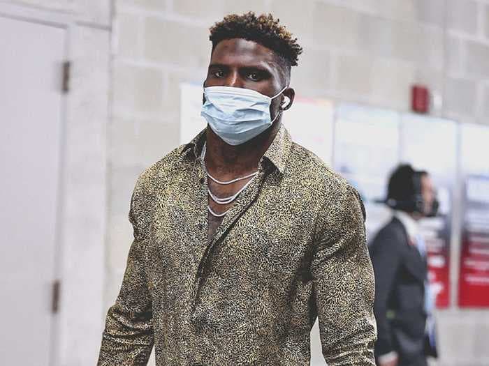 Tyreek Hill gave a nod to his 'Cheetah' nickname by showing up to the Super Bowl in a cheetah print shirt